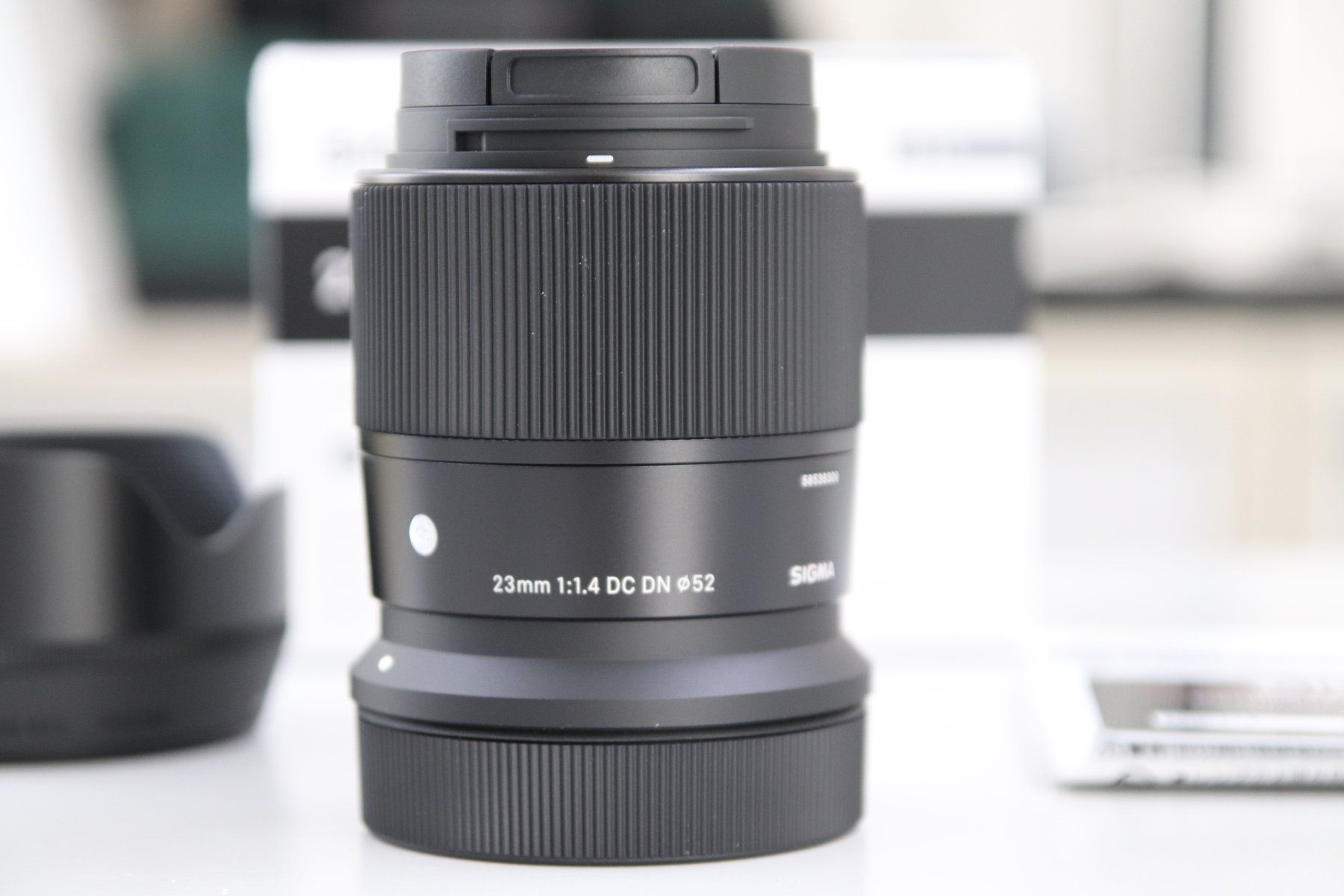 Sigma Obiettivi: Sigma 23mm 1.4 DC DN Canon RF-Mount / NEU – Nuovo e nell'imballaggio originale da Zofingen venduto da OWYSSAG 1