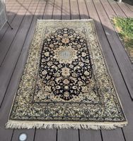 Nain Teppich 114 x 210cm blau gemustert 