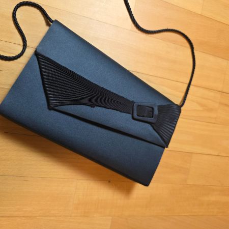 Elegante schwarze Giovanni Clutch Tasche