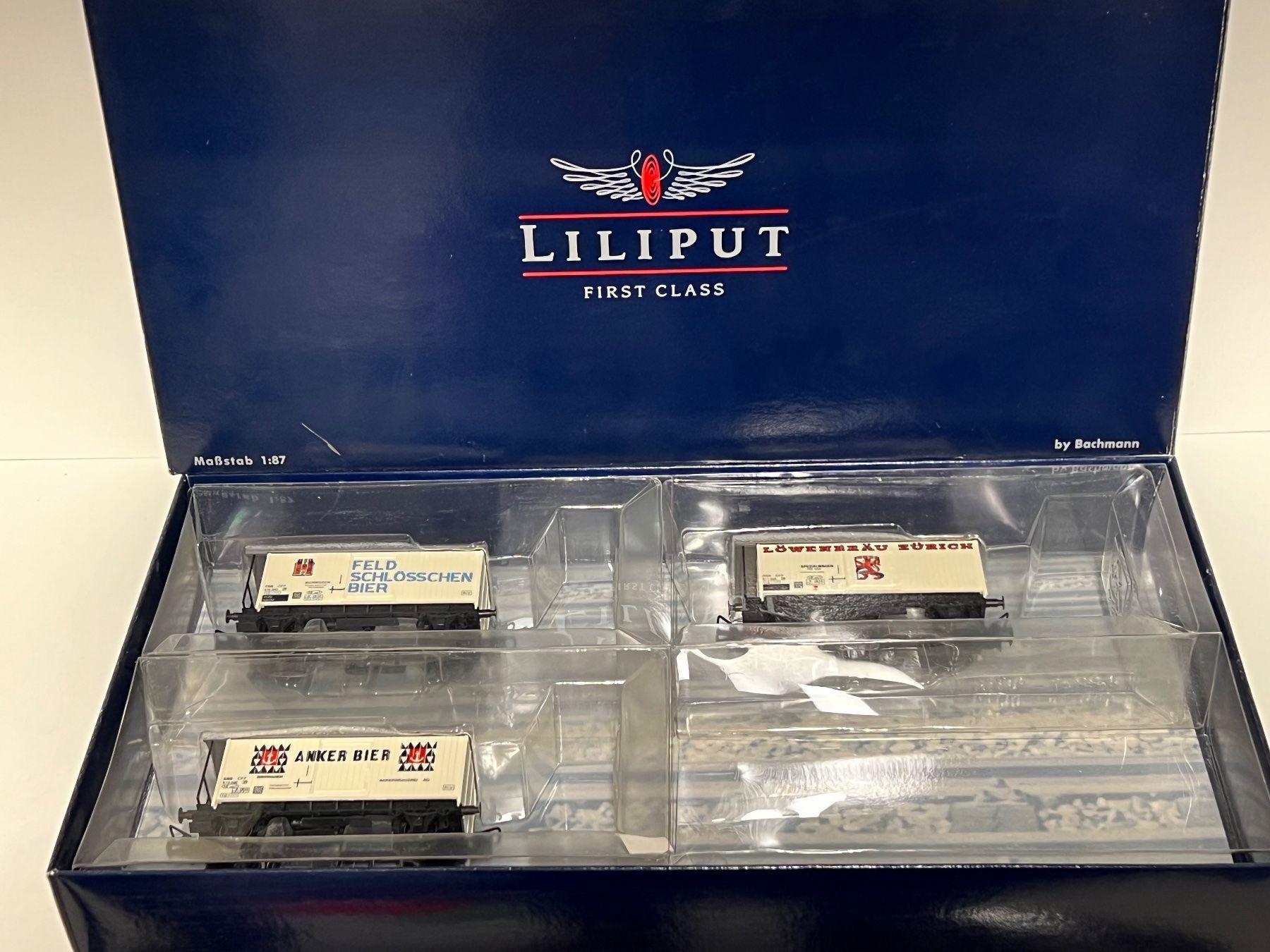 Liliput Modellini di ferrovie: LILIPUT H0 Bierwagen-Set "Schweizer Brauereien" – Nuovo e nell'imballaggio originale da Neuenhof venduto da ludovicco