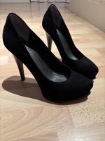 Guess Pumps