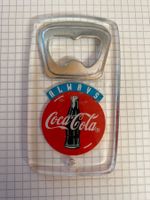 Décapusuleur Coca-Cola vintage en plastique transparent