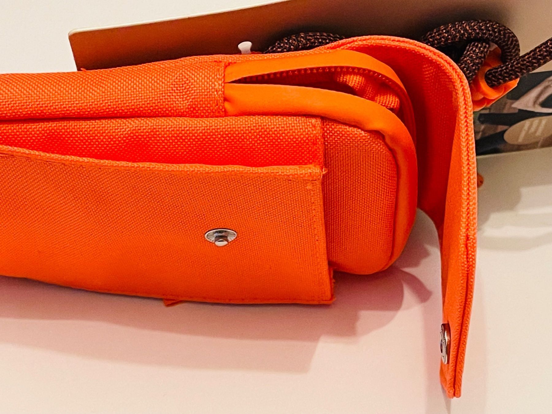 Borse da donna: Pochette sac multifonction Tchibo orange fluo – Nuovo e nell'imballaggio originale da Genève venduto da Murmurs 4