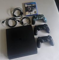 PS4 Slim 1 To + 3 manettes + NHL 24 + câbles