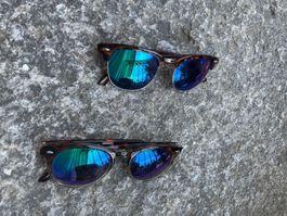 Sonnenbrillen mit Grün-blauen Gläser