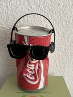 tanzende Coca-Cola Dose