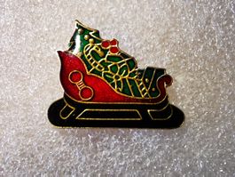 Ansteckpin 1: Schlitten Weihnachten