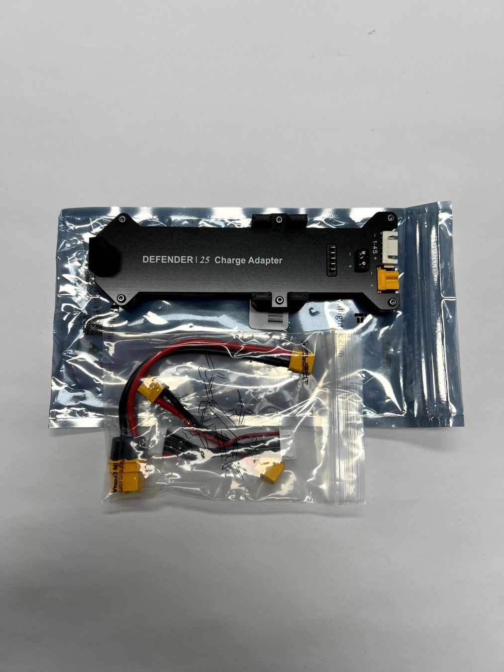DJI Batterie, Caricabatterie & Alimentatori: DEFENDER 25 Charge Adapter – Nuovo e nell'imballaggio originale da Herisau venduto da RemoteVisionGmbH 1