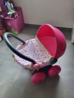 Poussette pour poupée rose bon état