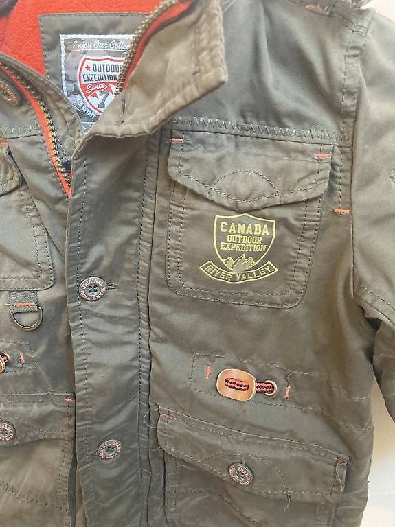 Jacken & Mäntel: Winterjacke Gr. 104, olive-orange – Gebraucht aus Lyss von stubenwagen 1