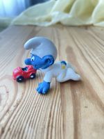 Schlumpf Baby mit Auto