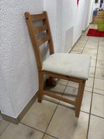 Holzstuhl mit Polstersitz gebrauchter Zustand