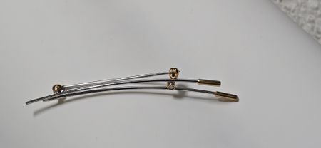 Brosche Weissgold/Gelbgold 750 mit Brillant 0.03 kt - L 6cm