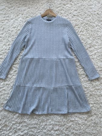 Robe bleu clair à volants taille L neuve