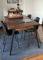 4 Esszimmerstühle – schwarz mit Sitzpolster