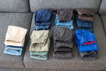 Kinderkleidung lange Hosen, versch. Materialien, 14 Stück