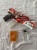 X-Shot Pistole mit Kugeln und Kugelbehälter