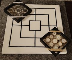 Mühle Spiel mit Damenuhren