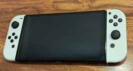 Nintendo Switch OLED mit Zubehör und Games
