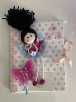 Handgemachtes Notizbuch mit Puppe