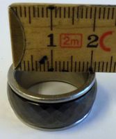 Ring mit drehbarem Mittel-Teil (Schwarz, lässt sich drehen)