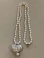 Elegante Perlenkette mit Herz-Anhänger in Silber