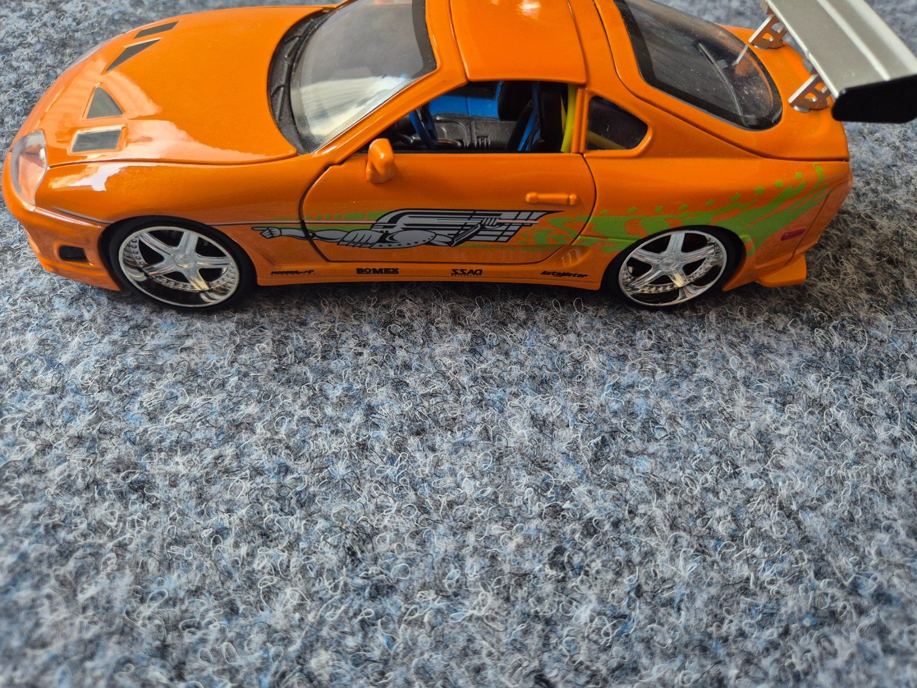 Toyota Modellini d'auto: Toyota Supra Modellauto Orange – Usato da Domat Ems venduto da tchnesa 2