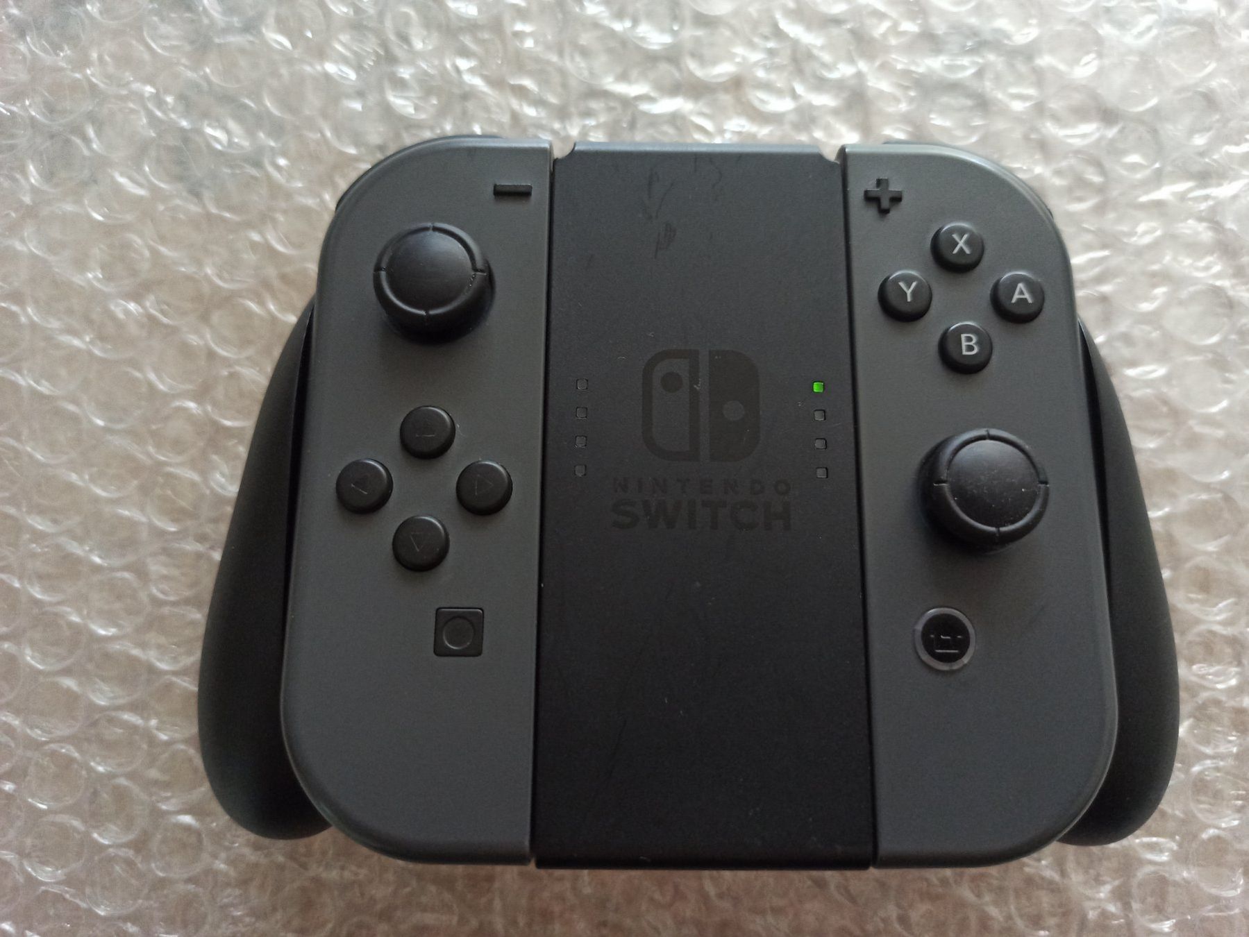 Nintendo Controller: Original Nintendo Switch Joy-Con (Grau) + Grip / NSW – Usato da Oberweningen venduto da mar_87mx 1
