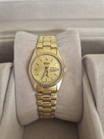 Montre Seiko femme quartz plaqué or jour date bon état