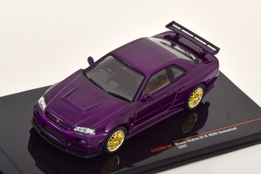 Nissan Skyline GT-R R34 Custom 2002 RHD violett met. 1:43 (Neu und ...