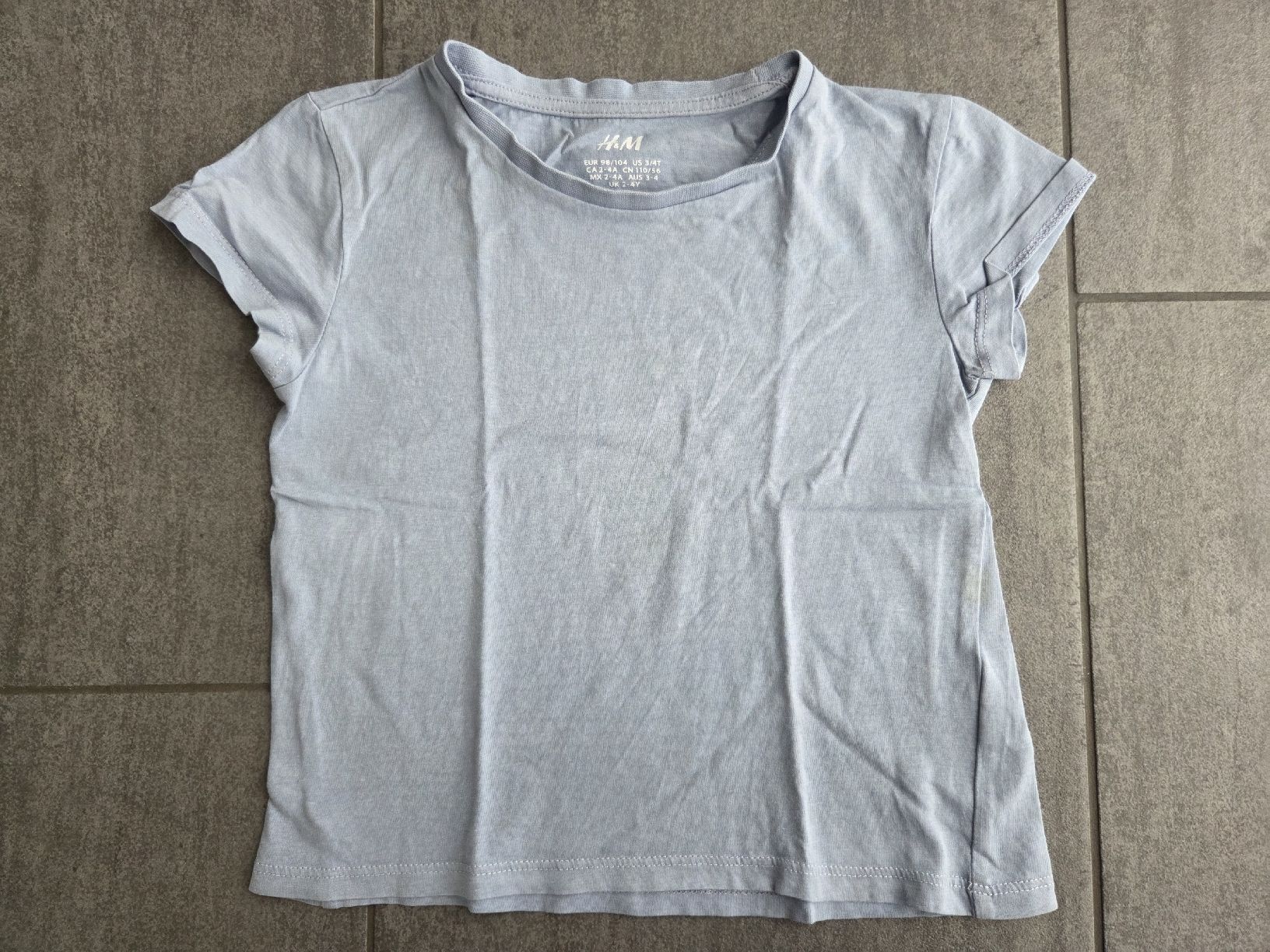 H&M Camicie, T-shirt & Polo: H&M Kinder T-Shirt hellblau Gr. 98/104 – Usato da Hüntwangen venduto da ManuM2014