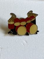 Pins Batterie rouge et or bon état