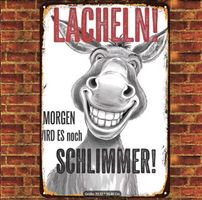 Schild "Lächeln! Morgen wird es noch schlimmer!"