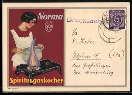 Dame mit Kochtopf an einem Spiritusgasko
