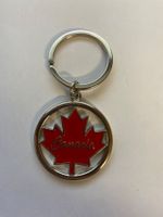 Porte-clés Canada motif feuille d'érable métal argenté