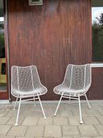 low Sculptura side chairs by Russell Woodard