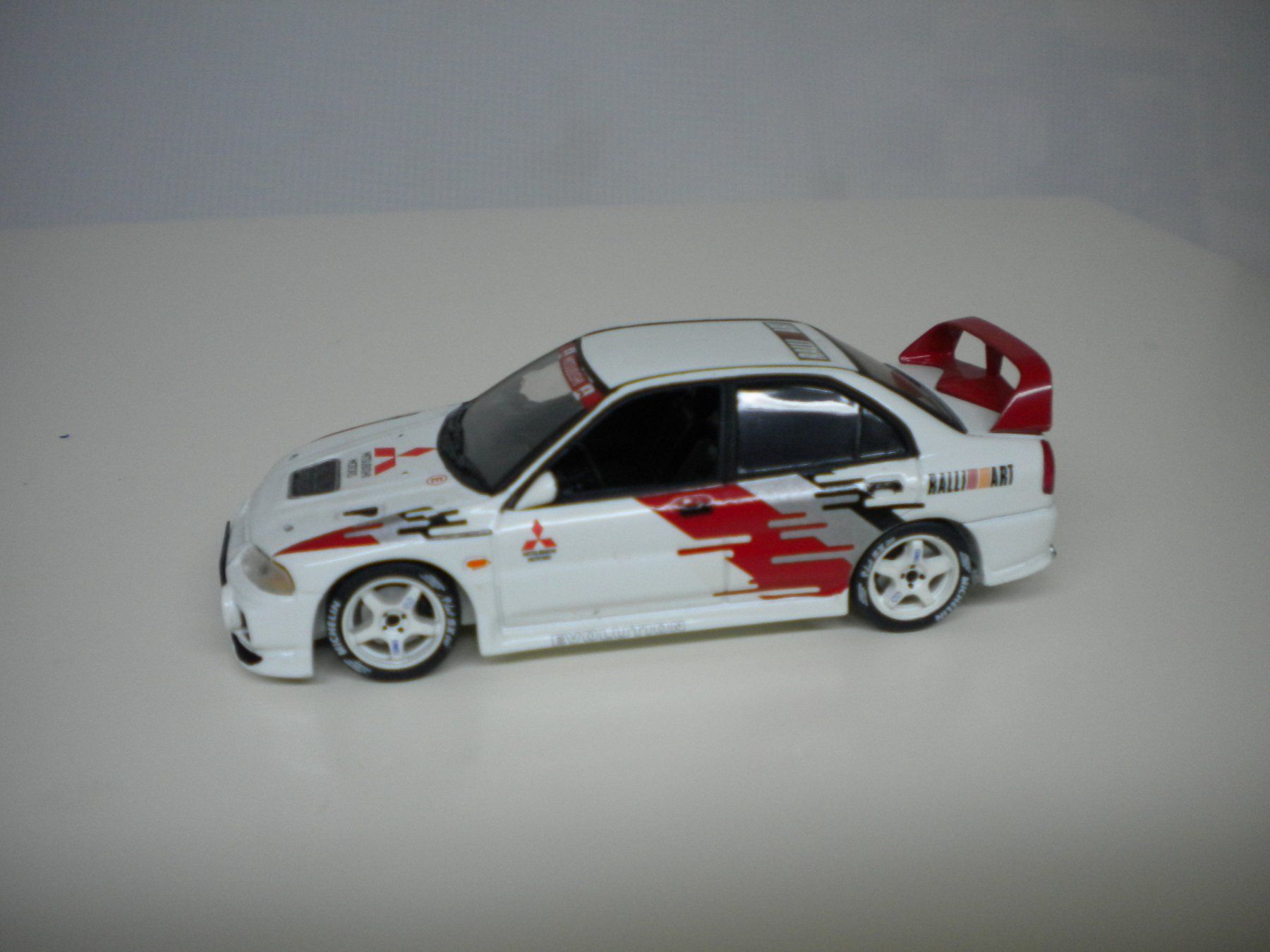 Mitsubishi Modellini d'auto: Mitsubishi Lancer Evo IV 1997 – Usato da Moutier venduto da cat365