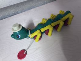 Spielzeug Raupe mit Hut und Schnur zum Ziehen Kunststoff