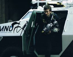 Sharlto Copley Autogramm signiert Foto 20x25cm