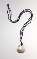 Collier vintage avec grand pendantif nacre