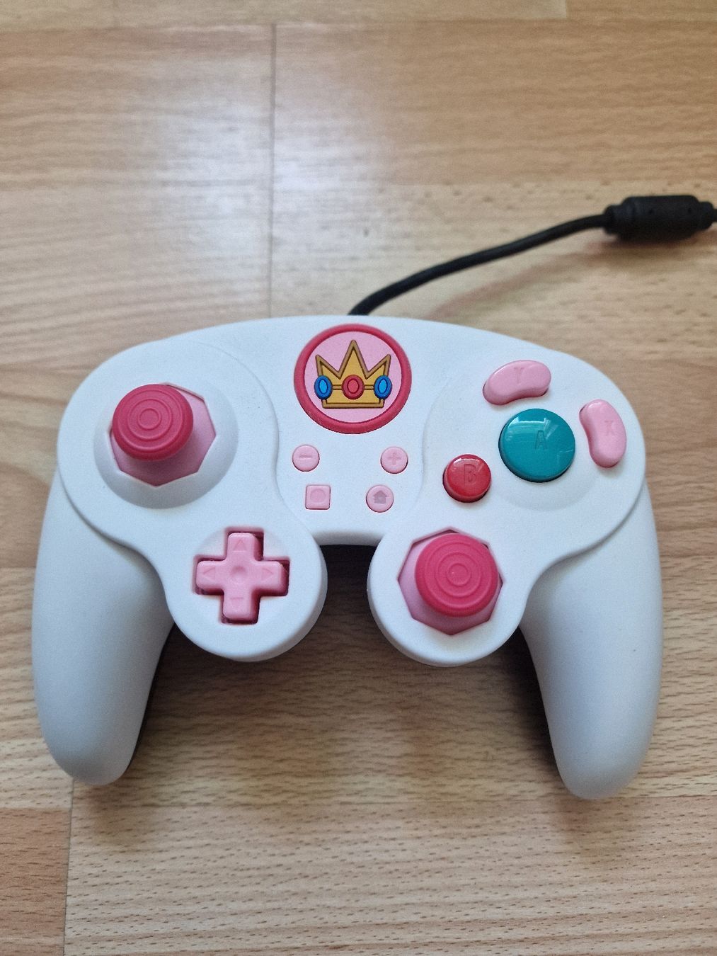 Controller: Peach PDP Wored Fight Pad Pro Switch Gamecube Controller Gut – Gebraucht aus Fahrwangen von luk_bhw7