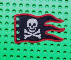 LEGO® Cloth Flag 8 x 5 Wave with Red Border and White Skull