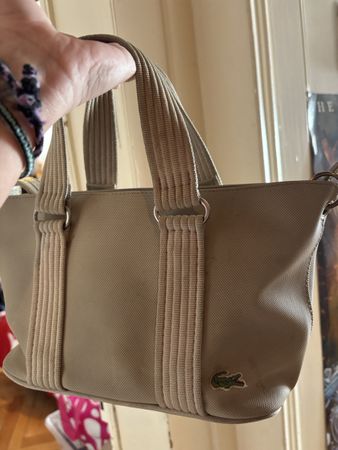 Sac Lacoste vintage beige - parfait pour le printemps!