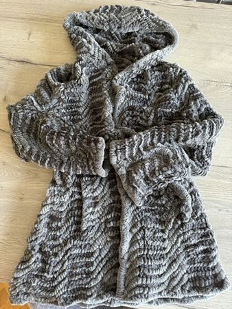 Veste en fourrure grise