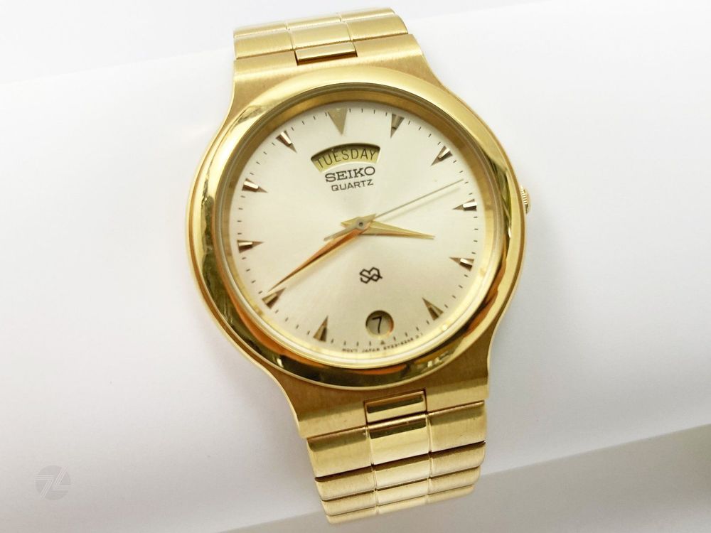 Seiko SQ S2 Herrenuhr Day Date 34 mm Quartz Gold Stahl Kaufen