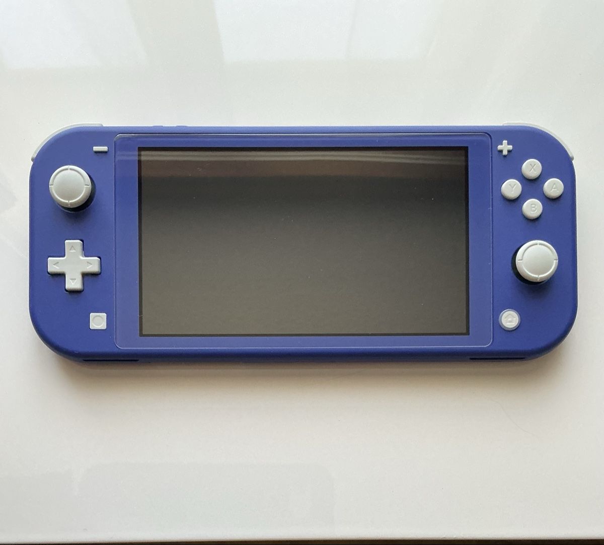 Nintendo Konsolen: Nintendo Switch Lite Blue – Gebraucht aus Schönenwerd von