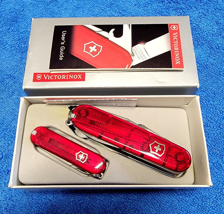 Victorinox Set SWISS CHAMP + SIGNATURE transparent red | Kaufen auf Ricardo