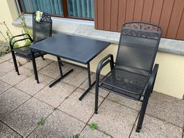 Gartentisch und 4 Stühle (stapelbar) aus Metall anthrazit