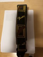 Gitarrengurt Fender schwarz mit Logo braun gebraucht