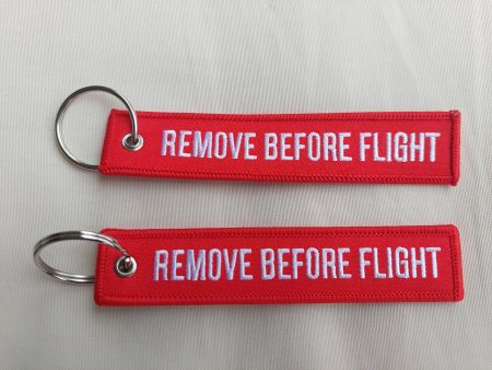 1 Paar REMOVE BEVOR FLIGHT - Schlüsselanhänger